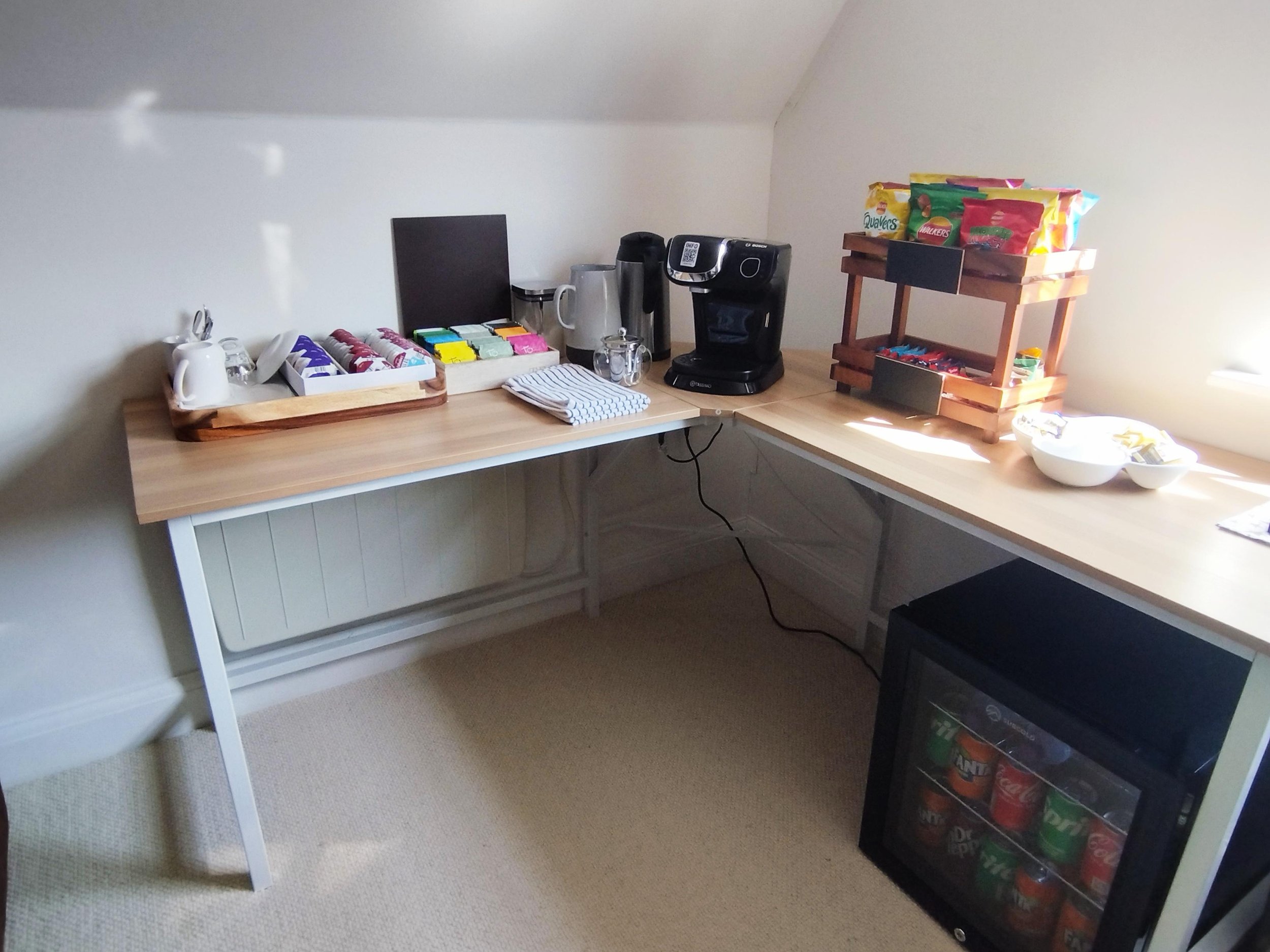 Refreshment station with drinks and snacks